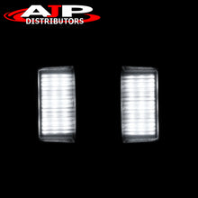 Load image into Gallery viewer, Nissan Titan 2007-2015 / Armada 2008-2015 / Frontier 2007-2021 / Xterra 2007-2015 / Suzuki Equator 2009-2012 White SMD LED License Plate Lights Clear Len